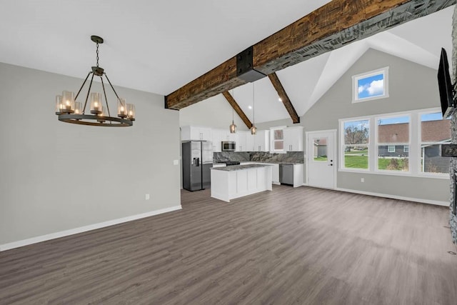 unfurnished living room featuring high vaulted ceiling, a notable chandelier, beamed ceiling, baseboards, and dark wood-style flooring