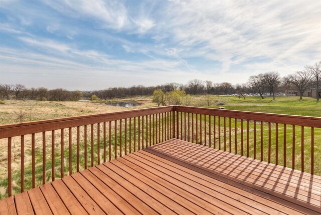 172 Crossroads Dr, Des Moines, IA 50320 - wooden deck with a lawn and a water view