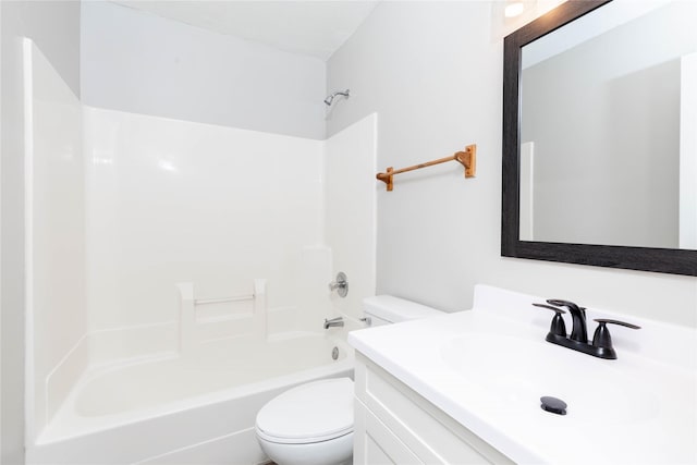bathroom with washtub / shower combination, toilet, and vanity