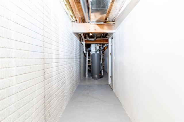 unfinished basement with gas water heater
