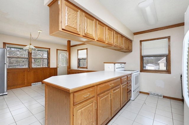 7422 Oak Brook Dr, Urbandale, IA 50322 - kitchen featuring white electric range oven, freestanding refrigerator, visible vents, and light tile patterned floors