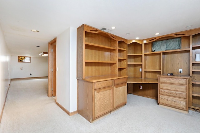 7422 Oak Brook Dr, Urbandale, IA 50322 - interior space with visible vents, light carpet, and built in desk