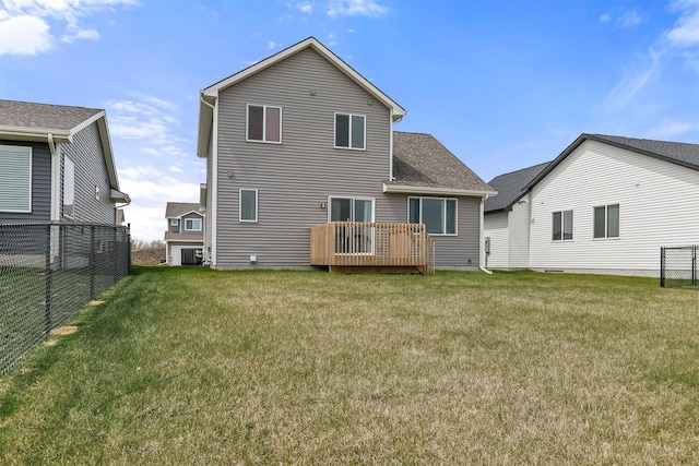 back of house with fence, central AC unit, a yard, and a deck