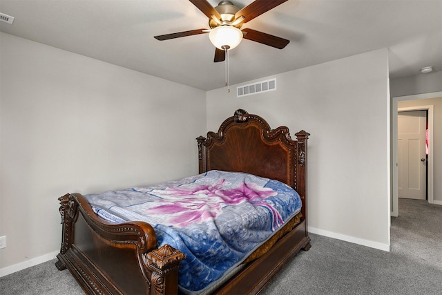 carpeted bedroom featuring ceiling fan, baseboards, and visible vents