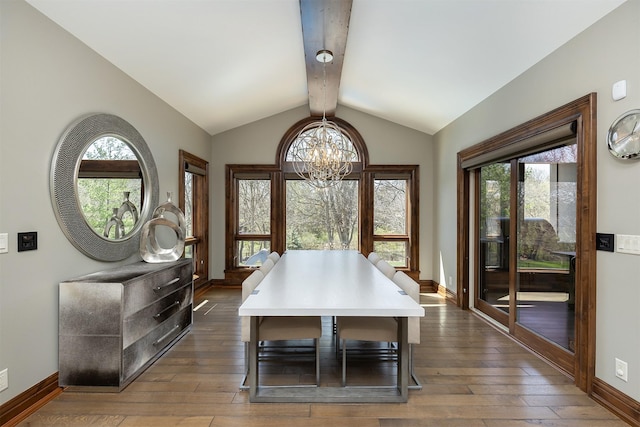 dining area featuring dark wood finished floors, an inviting chandelier, vaulted ceiling with beams, and baseboards