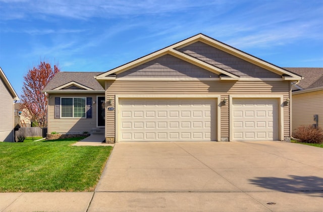 ranch-style home with concrete driveway, a front yard, an attached garage, and roof with shingles