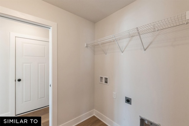 4412 NE 8th St, Ankeny, IA 50021 - laundry area featuring laundry area, wood finished floors, hookup for an electric dryer, hookup for a washing machine, and baseboards