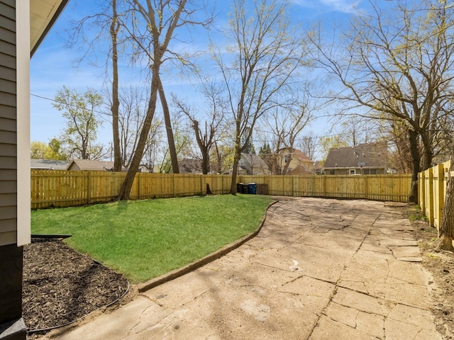 1710 Forest Ave, Des Moines, IA 50314 - view of yard featuring a fenced backyard and a patio