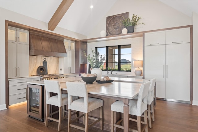 3815 NW 183rd St, Clive, IA 50325 - dining room featuring beverage cooler, high vaulted ceiling, dark wood-style flooring, recessed lighting, and beam ceiling