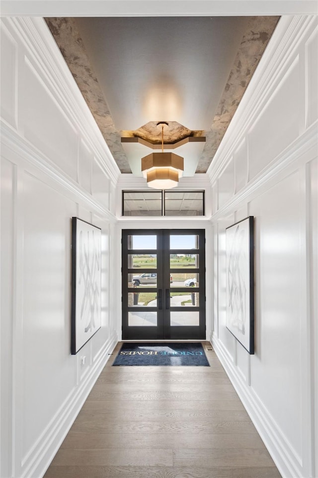 3815 NW 183rd St, Clive, IA 50325 - foyer entrance featuring wood finished floors, beamed ceiling, and french doors