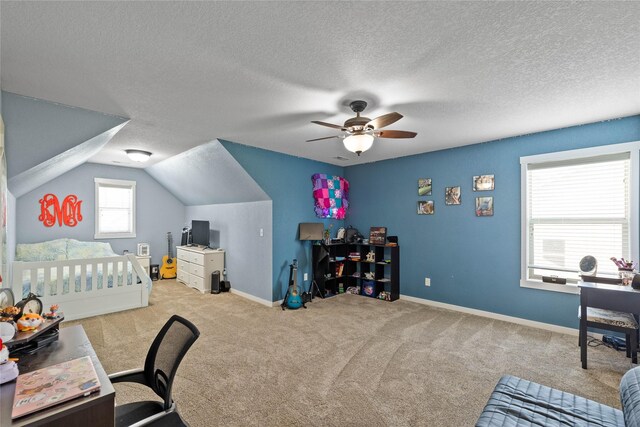 2307 SE 17th St, Ankeny, IA 50021 - bedroom featuring vaulted ceiling, baseboards, carpet, and a ceiling fan