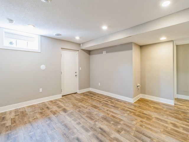 3826 Grand Ave, Des Moines, IA 50312 - basement with light wood-style floors and recessed lighting
