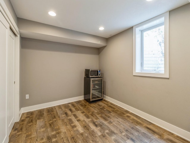 3826 Grand Ave, Des Moines, IA 50312 - below grade area with dark wood-style flooring and recessed lighting