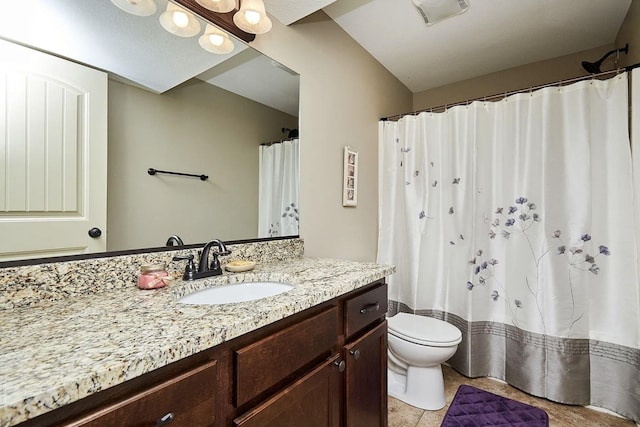 bathroom featuring tile patterned flooring, toilet, vanity, and visible vents