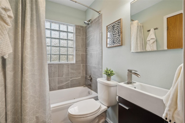 1804 E 33rd St, Des Moines, IA 50317 - full bath featuring toilet, vanity, and shower / bath combo