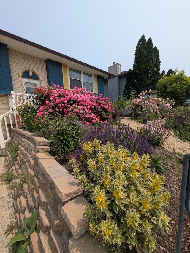 310 E Emma Ave, Des Moines, IA 50315 - view of home's exterior with brick siding