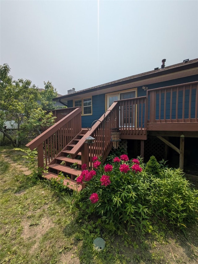 310 E Emma Ave, Des Moines, IA 50315 - rear view of house with stairway and a deck