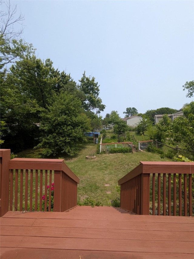 310 E Emma Ave, Des Moines, IA 50315 - wooden deck featuring a yard