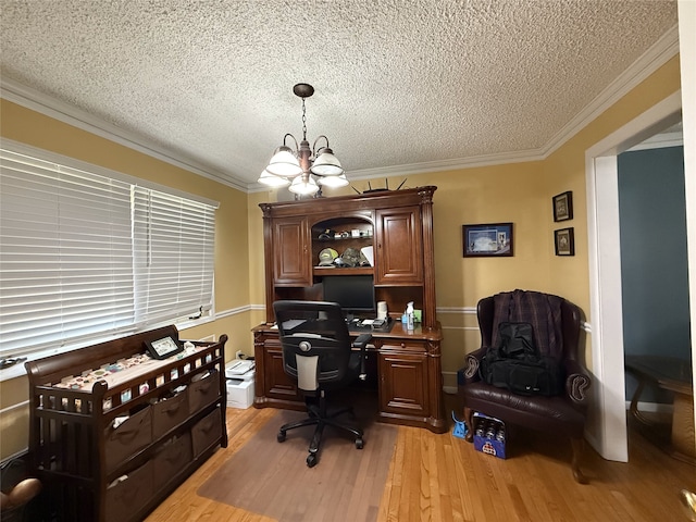 210 11th Ave SW, Altoona, IA 50009 - home office with a textured ceiling, light wood-type flooring, ornamental molding, and a chandelier
