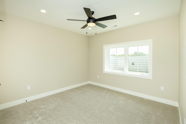 1204 Westview Dr, Huxley, IA 50124 - unfurnished room featuring light colored carpet, recessed lighting, baseboards, and ceiling fan