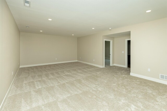 1208 Westview Dr, Huxley, IA 50124 - unfurnished room with recessed lighting, light colored carpet, and baseboards