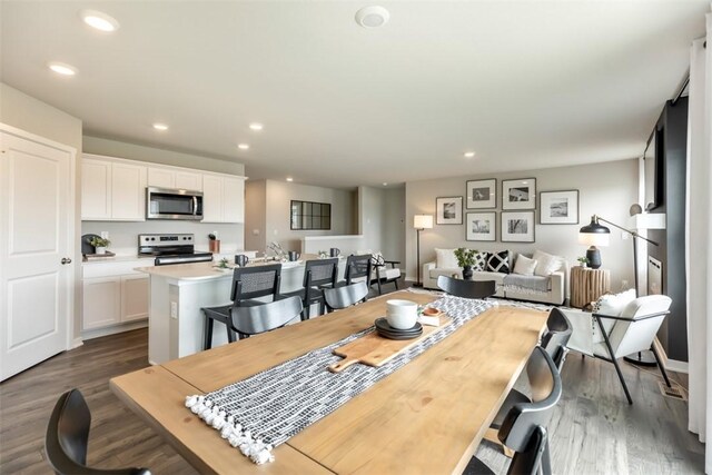 2224 SE Creekhill Way W, Des Moines, IA 50265 - dining room with recessed lighting and dark wood finished floors