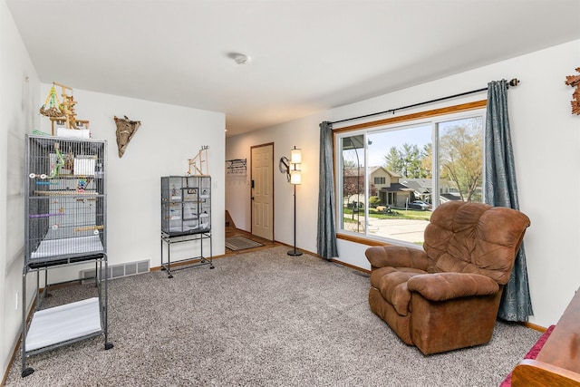 4830 70th Pl, Urbandale, IA 50322 - living area featuring carpet and baseboards