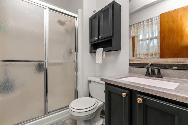 4830 70th Pl, Urbandale, IA 50322 - full bath featuring a shower stall, toilet, and vanity