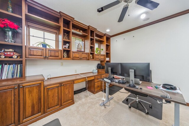 9289 Winterberry Ct, West Des Moines, IA 50266 - office space with light carpet, recessed lighting, built in study area, ceiling fan, and ornamental molding