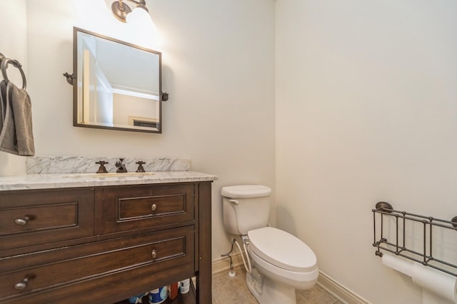 9289 Winterberry Ct, West Des Moines, IA 50266 - half bathroom with toilet, vanity, tile patterned floors, and baseboards