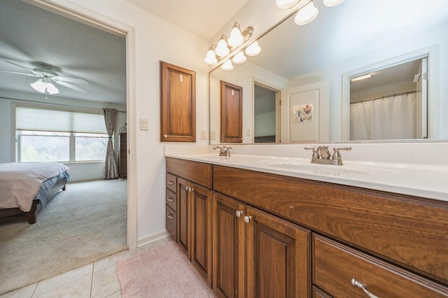 9289 Winterberry Ct, West Des Moines, IA 50266 - full bath featuring connected bathroom, tile patterned floors, a sink, and double vanity