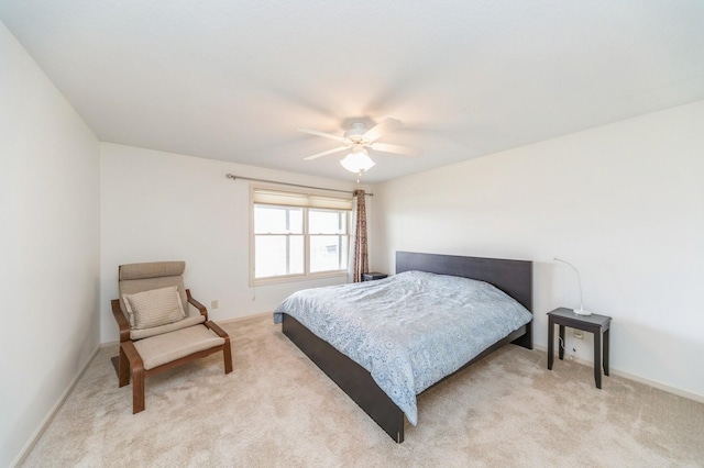 9289 Winterberry Ct, West Des Moines, IA 50266 - bedroom featuring a ceiling fan, baseboards, and light carpet