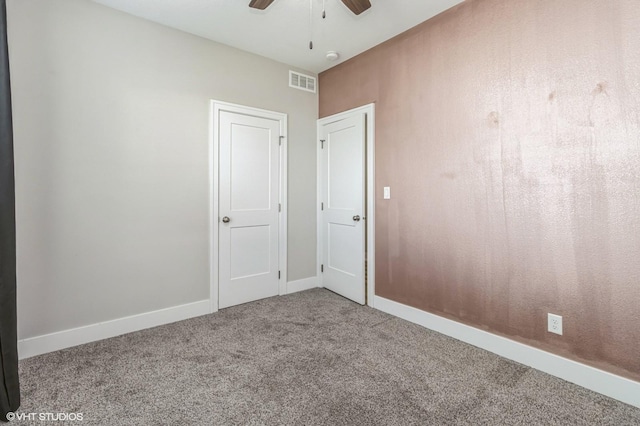 4901 NW 15th St, Ankeny, IA 50023 - carpeted empty room with baseboards, a ceiling fan, and visible vents