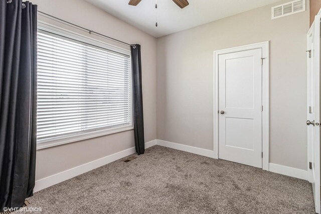 4901 NW 15th St, Ankeny, IA 50023 - unfurnished bedroom with carpet floors, visible vents, and baseboards