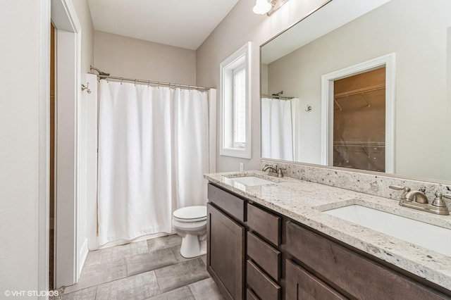 4901 NW 15th St, Ankeny, IA 50023 - full bath with toilet, a shower with curtain, a sink, and double vanity