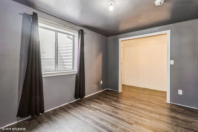 4901 NW 15th St, Ankeny, IA 50023 - spare room with wood finished floors