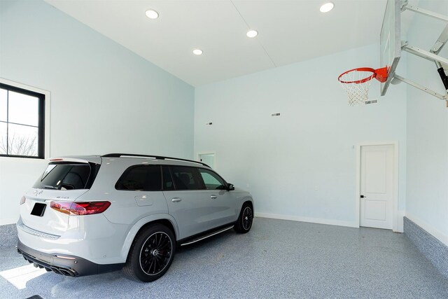 5094 Grand Ridge Dr, West Des Moines, IA 50265 - garage with baseboards and recessed lighting