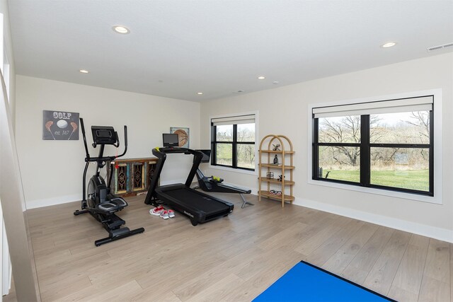 5094 Grand Ridge Dr, West Des Moines, IA 50265 - exercise room featuring light wood finished floors and recessed lighting