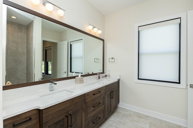 5094 Grand Ridge Dr, West Des Moines, IA 50265 - full bath with double vanity and tile patterned floors
