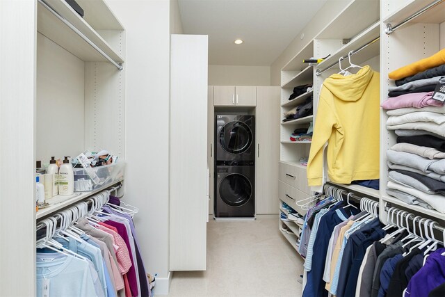 5094 Grand Ridge Dr, West Des Moines, IA 50265 - walk in closet with estacked washer and dryer and carpet
