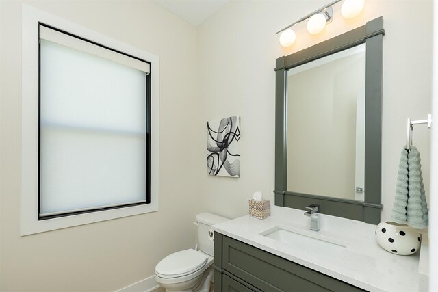 5094 Grand Ridge Dr, West Des Moines, IA 50265 - bathroom featuring vanity and toilet