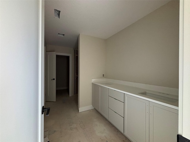 1258 S 92nd St, West Des Moines, IA 50266 - hallway featuring baseboards