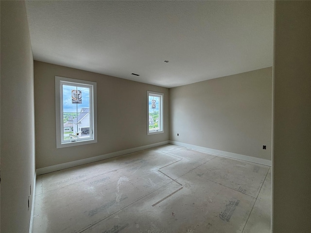 1258 S 92nd St, West Des Moines, IA 50266 - empty room featuring baseboards