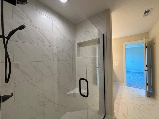 1258 S 92nd St, West Des Moines, IA 50266 - bathroom with marble look tiles and a shower stall