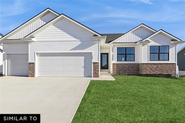 4308 NE 8th St, Ankeny, IA 50021 - craftsman house with brick siding, driveway, a front lawn, and a garage
