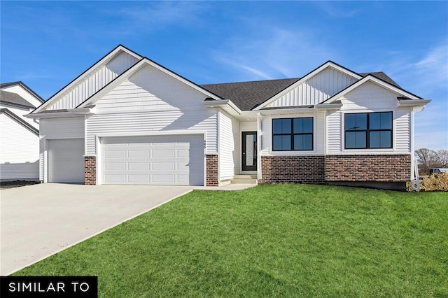 4308 NE 8th St, Ankeny, IA 50021 - craftsman inspired home with board and batten siding, driveway, brick siding, a front yard, and a garage