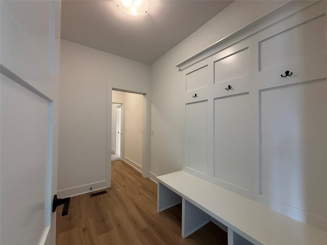 4655 178th St, Urbandale, IA 50263 - mudroom with wood finished floors and baseboards