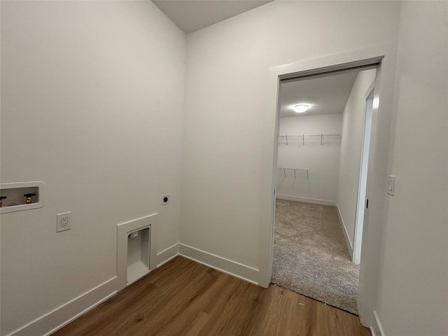 4655 178th St, Urbandale, IA 50263 - laundry area with hookup for a washing machine, hookup for an electric dryer, dark wood-style flooring, and baseboards