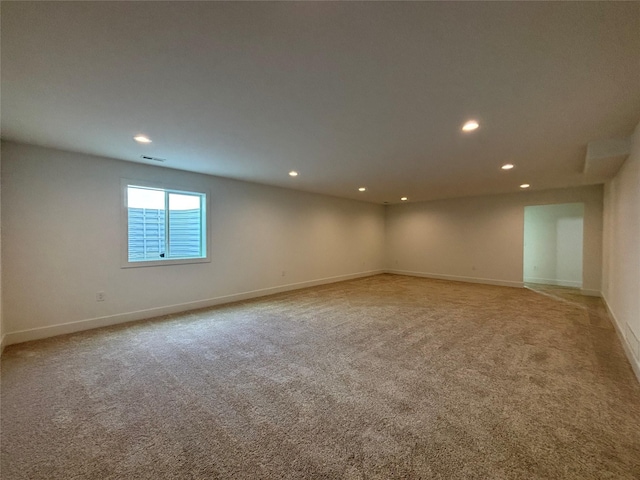 4655 178th St, Urbandale, IA 50263 - empty room with light carpet, recessed lighting, and baseboards