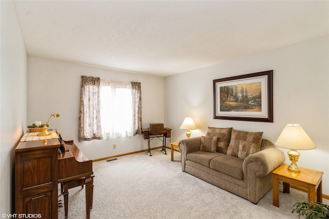 9601 NE 28th Ct, Ankeny, IA 50021 - living area with visible vents, baseboards, and carpet